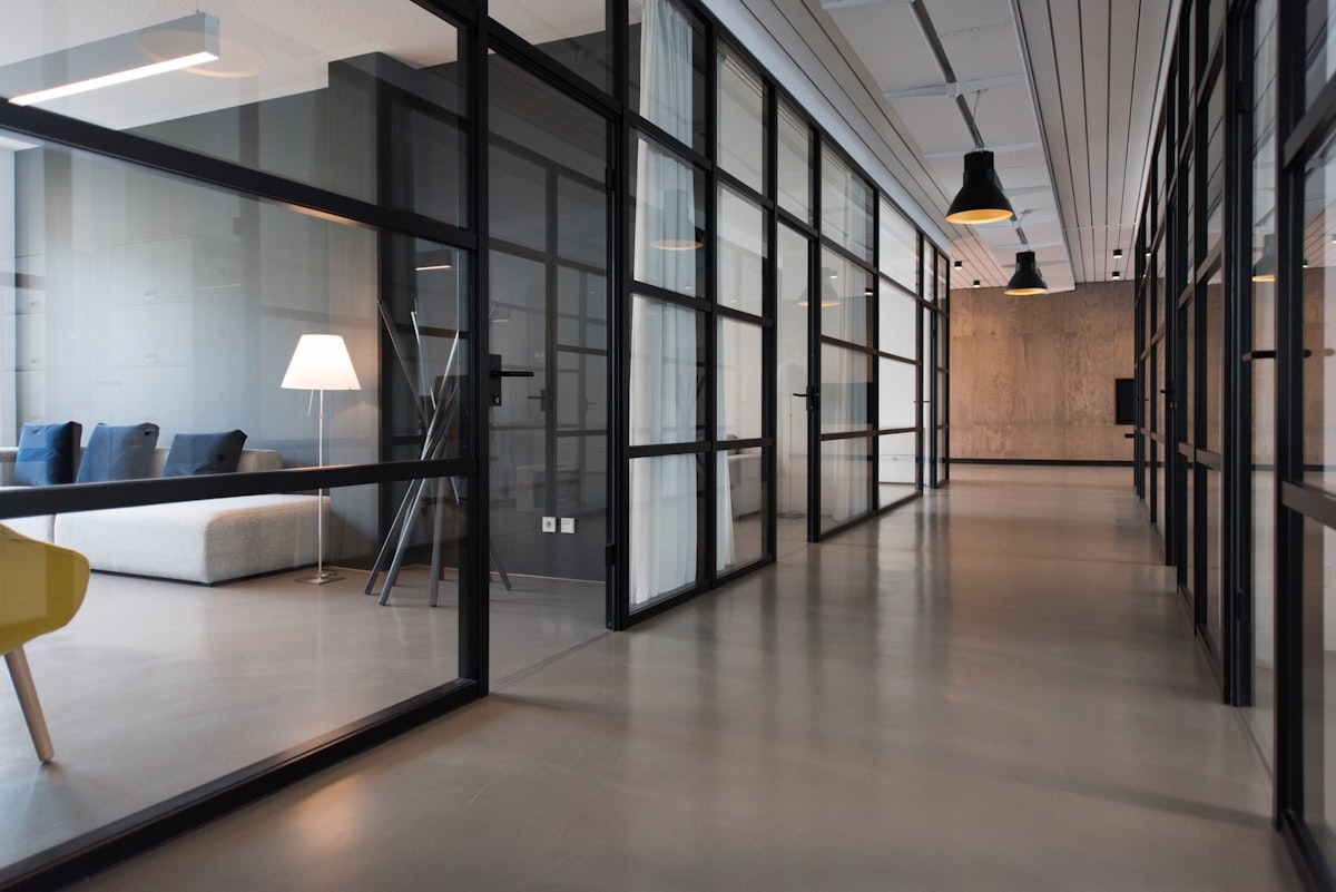 An empty office corridor after hours.